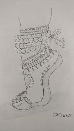 a drawing of a boot with beads on it