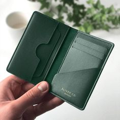 Oliver Co. has released an upgraded version of their renowned Compact Wallet, featuring vegan materials that set it apart from the competition. With a focus on sustainability and utmost attention to detail, this RFID-protected wallet is crafted with premium smooth apple leather and a recycled polyester microfiber 'suede' lining. Its sophisticated design comfortably holds up to 11 credit cards, folded bills, and receipts. The apple leather used is superior to conventional leathers, offering excep Oliver And Co, Leather Wallet Pattern, Minimalist Leather Wallet, Vegan Wallet, Compact Wallet, Handmade Leather Wallet, Leather Card Case