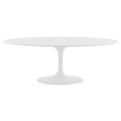 a white table with an oval top on a white background in the shape of a tulip