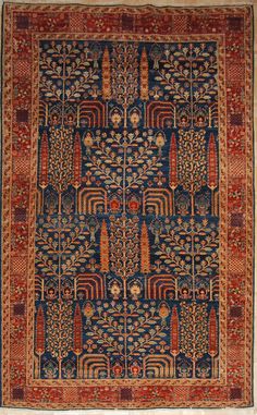 an antique persian rug with blue and red colors