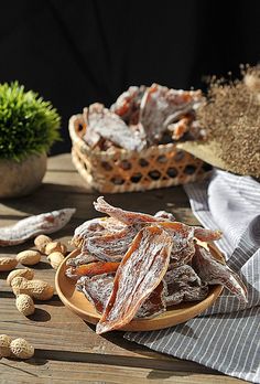 nuts and other foods are on a table