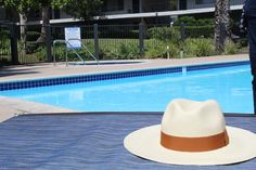 Ecuadorian Panama Hat hand woven with toquilla straw by Ecuadorian natives. They are authentic, of very high quality, and built to last. This hat size is 7 1/8 or Medium. Toquilla Straw Wide Brim Hat For Pool, Wide Brim Toquilla Straw Hat For Pool, Straw Fedora Panama Hat For Pool, Straw Fedora Panama Hat For The Pool, Flat Brim Toquilla Straw Hat For Pool, Flat Brim Straw Hat For Pool, Pool Panama Hat With Curved Brim In Toquilla Straw, Brimmed Toquilla Straw Hat For Poolside, Poolside Fedora In Toquilla Straw