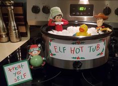 an elf is in the hot tub with his friends