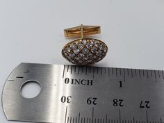 Title: Set of Oval Gold Cufflink with Pave Diamonds 14KT Yellow Gold Designer: NONE MaterialYellow Gold 14kt Stamped Style: Vintage All measurements are approximate and may vary slightly from the listed dimensions. 82 Diamonds of 2.4 mm approx. each Round 4.10 CT approx. Color : G-H Clarity: VS Estimated Measurements19.36mm x 14.60mm x 5.38mm Estimated Total Weight of the Item : DWT: 7.5 Grams: 11.6 ConditionPre-owned- In Very Good Condition -light Scratches. Dealer number EE0000130-CL PLEASE LO Elegant Round Diamond Cufflinks, Classic Diamond Cufflinks With Polished Finish, Gold Round Elegant Cufflinks, Elegant Gold Round Cufflinks, Diamond Cufflinks With Polished Finish For Formal Events, Formal Diamond Cufflinks With Polished Finish, Classic Yellow Gold Round Cufflinks, Hallmarked Yellow Gold Cufflinks For Formal Occasions, Classic Diamond Cufflinks For Anniversary