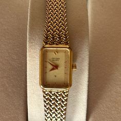 Vintage Citizen Quartz Gold Watch 1980’s Textured / Embossed Gold Plated Bracelet With Fold Over Clasp Tank Style Watch - Face Is 1/2” Wide And 5/8” Height Movement: Quartz Assembled: Frankfurt Germany Case Material: Stainless Steel Vintage: 1985 Size: 6 ½” (Adjust To 6 ¾” Larger, If Needed) Can Easily Be Sized Down Too Gently Worn And In Good Working Condition! Does Not Come In The Original Box. Beautiful Addition To Your Watch Collection! Petite, Classic, Sophisticated Yet Understated. Not Shiny Gold, Looks More Like 14kt Gold. Preloved Condition! If You Have Questions Or Would Like More Photos, Just Let Me Know. Thank You! Gold Vintage Watch, Tank Watch, Frankfurt Germany, Vintage Tank, Style Watch, Gold Plated Bracelets, Watch Faces, Watch Collection, 14kt Gold