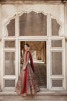 Traditional Red Lehenga Choli Dupatta Bridal Attire Floor-length Jamawar Anarkali Set For Wedding, Floor-length Jamawar Dress For Reception, Wedding Gown With Zari Work In Jamawar, Traditional Jamawar Gown With Dupatta, Red Unstitched Gown For Designer Wear, Traditional Wedding Gown In Jamawar, Wedding Dress With Sheer Dupatta And Jamawar Material, Traditional Jamawar Wedding Gown, Wedding Dresses With Sheer Dupatta In Jamawar