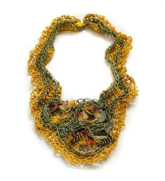 Unique Fiber Art Necklace, rustic elegance inspired by the beauty of nature, this artisan piece is perfect for the woman who loves to stand out in style.   Meticulously crafted by me at my AngyArt Studio in London, this necklace features a lace-effect foundation in rich mustard and green hues, achieved through intricate crochet and knitting techniques.  Adding a touch of rustic and artistic charm, the necklace is adorned with a textile and fibers accents. The result is a delicate and feminine de Types Of Silk Fabric, Intricate Crochet, Art Necklaces, Linen Yarn, Fibre Art, Green Hues, Feminine Design, Knitting Techniques, Crochet Accessories