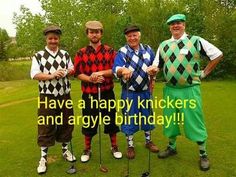 three men in clown costumes standing next to each other on a green grass covered field