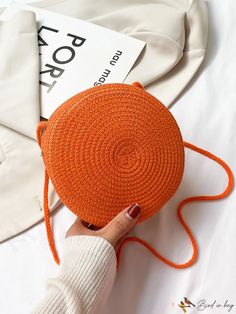 BirdinBag - Compact Circular Straw Bag - Contemporary Minimalist Style Casual Orange Handheld Shoulder Bag, Casual Orange Handheld Bag, Casual Orange Shoulder Bucket Bag, Summer Orange Satchel Shoulder Bag, Casual Orange Bucket Crochet Bag, Casual Orange Straw Shoulder Bag, Casual Orange Crochet Bucket Bag, Casual Orange Mobile Phone Bag, Casual Orange Bag With Adjustable Strap