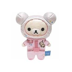 a small stuffed animal with a pink outfit on it's head and ears,