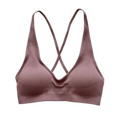 Experience style and comfort in one package with the Mauve Seamless Ribbed Cross Back Bralette. This chic bralette, perfect for both loungewear and sports purposes, promises unrivaled comfort and flexibility. Made with soft, ribbed fabric that hugs your curves, it showcases a stylish cross-back design that guarantees support and a free range of motion. Whether you're studying, working out, or just lounging around, this bralette can keep up with your busy schedule. It's naturally breathable, ensu