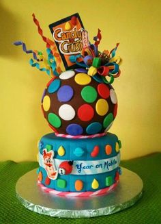 a birthday cake decorated with candy and confetti