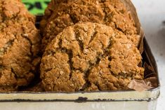 some cookies are in a tin on a table