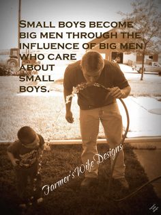 a man holding a hose while standing next to a little boy