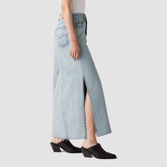 Our Long Icon Skirt is the timeless, maxi denim skirt you’ve been searching for, with a mid rise and the iconic Levi’s® details you know and love . Flip it over and you’ll find two back pockets that were designed to flatter just like the ones on your favorite 501® jeans. In 1873, Levi's ® invented the blue jean. What started as a piece of clothing for the American worker quickly became an icon of American style around the globe. And every Levi's ® style is crafted with the same high standard of Trendy High-rise Maxi Skirt For Spring, Denim Blue Full-length Maxi Skirt, Full Length Denim Blue Maxi Skirt, Chic Fitted Medium Wash Maxi Skirt, Levi's Full-length Medium Wash Bottoms, Levi's Medium Wash Full Length Bottoms, High-rise Blue Denim Maxi Skirt, Fitted High Rise Blue Maxi Skirt, Full-length Denim Skirt With Frayed Hem