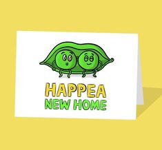 a greeting card featuring two peas with the words'happea new home '