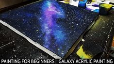 a painting for beginners using galaxy acrylic paint on canvases and paper