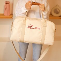 "Our new Weekender Bag is made from premium cotton canvas and is the perfect size for all of your wedding activities! * Monogramming is embroidery - get names, titles, monograms, initials! * Fully lined in cotton with small zipper pocket insert. * Interior Pocket to store essentials * Detachable shoulder strap DIMENSIONS : * Size : 20\" X 6.6\" X 11.8\" (L x W x H) Handle Height is 9.8\" Extended Strap Length is 55\" HOW TO ADD MONOGRAMMING DETAILS: 1. Choose your Bag color from the dropdown men Bag With Initials, Bridesmaid Tote Bags, Cadeau Baby Shower, Bridesmaid Bags, Wedding Activities, Sac Week End, Personalized Bride, Dance Bag, Personalized Bridesmaid Gifts