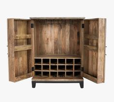 an open wooden cabinet with wine bottles in the bottom section and shelves on each side