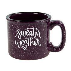 a purple coffee mug with the words sweater weather written on it's side in white ink