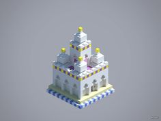 an image of a castle made out of legos on top of a building with yellow and blue stripes