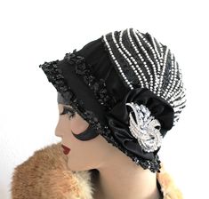 Women's black and white gala event 1920s flapper style hat, perfect for that special night out on the town.  The hat is made from all natural open woven fabrics detailed with a vintage pearl art deco stylized applique.  The brim of the hat is accented with a elaborate sequined trim.  An oversized elegant rhinestone brooch adds just the right touch of glitz. This hat is handmade by me and is one of a kind.  Perfect for a comfortable and elegant wear for summer.    Medium (22 to 22 1/2")    How to measure your head.... Take a cloth measuring tape around the back of your head and over your ears. Have the tape meet on your forehead where you want the hat to sit. Do this several times as an accurate measurement is important.  Hats are 100% handmade using traditional tailoring techniques and the Downton Abbey Wedding, Abbey Wedding, Edwardian Hat, Pearl Art, Chanel Style Jacket, Elegant Wear, Gala Event, Tailoring Techniques, Garden Dress