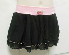 2 Layer Black mesh ruffled skirt with pink trim. The waist is stretch and the skirt is a pull up so it is easy. Size is small child and it will easily fit up to a 6x child. Style 95829 CB HWe ship out same day Monday through Friday (unless you buy after 2pm which is when our pickup is)  We have tens of thousands of dance costume items, check out our other listings! We happily combine shipping, just add the items to your cart and hit the "request an invoice from the seller" We will invoice y Cute Black Skirt With Ruffles, Cute Fitted Black Skirt, School Fitted Tiered Skirt, Queen Moodboard, Agejo Gyaru, Fashionista Outfits, Ribbon Rosettes, Rose Depp, Gyaru Fashion