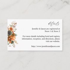 a business card with an orange and white flower arrangement on the front, in black ink