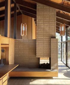 Arcade Architecture, Dream House Aesthetic, Cabin Fireplace, Brutalist Buildings, Stove Fireplace, Indoor Fireplace, Round House, Fireplace Tile, Brick Building