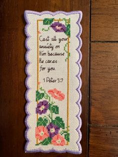 a cross stitch bookmark with flowers on it and the words, can't all you