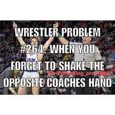 two people standing in front of a crowd holding their hands up with the words wrestler problem