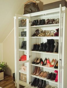 the closet is full of shoes and purses