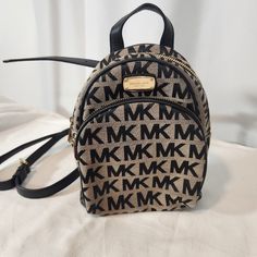 New Without Any Use. Casual Michael Kors Bag With Logo, Casual Michael Kors Backpack With Adjustable Strap, Brown Backpack With Logo For Everyday Use, Everyday Brown Backpack With Logo, Bags Michael Kors, Mini Purse, Backpack Purse, Black Tan, Michael Kors Bag