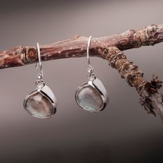 Beautiful Pear-Shaped Labradorite Earrings in Sterling Silver.  These elegant labradorite earrings can be worn flawlessly with any attire and for any purpose.  They come presented in a brand box Please use silver polishing cloth and avoid contact with chemicals. Teardrop Labradorite Earrings, Elegant Labradorite Dangle Earrings, Labradorite Teardrop Earrings For Gift, Labradorite Teardrop Earrings As Gift, Elegant Nickel-free Labradorite Earrings, Elegant Labradorite Drop Earrings, Labradorite Drop Earrings With Natural Stones, Elegant Labradorite Jewelry For Pierced Ears, Nickel-free Labradorite Drop Earrings