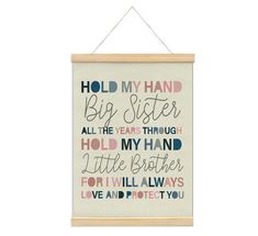 a wooden framed sign with the words hold my hand and big sister