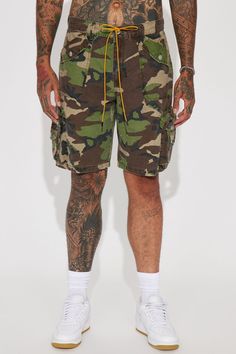 Available In Camouflage. Button Closure Zip Fly Bungee Waist Cord Side Hand Pockets Back Pockets Cargo Pockets 100% Cotton Imported | Mens Games Calling Cargo Shorts in Camouflage size 34 by Fashion Nova Combat Style Khaki Shorts With Pockets, Khaki Combat Shorts With Cargo Pockets, Camouflage Cotton Bottoms With Side Pockets, Summer Combat Cotton Bottoms, Combat Cargo Style Bottoms For Summer, Summer Combat Cargo Bottoms, Summer Combat Cargo Style Bottoms, Military Camouflage Bottoms With Relaxed Fit, Military Camouflage Relaxed Fit Bottoms