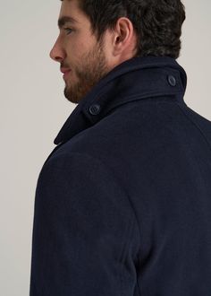 The Classic Tall Men's Coat Every Detail Tailored to Perfection Step out in style no matter the weather with our Double-Breasted Wool Peacoat, perfectly tailored for tall men. This extra-long wool coat offers a modern fit with poly fill insulation and a sleek satin lining, ensuring warmth and comfort. The set-in pockets and point collar add a touch of classic elegance, making it a timeless addition to your wardrobe.• Poly fill for extra warmth• Satin lining for smooth comfort• Point collar for a Classic Navy Outerwear With Concealed Placket, Navy Outerwear With Notch Lapel And Concealed Placket, Tailored Navy Outerwear With Concealed Placket, Navy Outerwear With Hidden Button Closure For Winter, Winter Double-breasted Sport Coat With Concealed Placket, Winter Peacoat With Concealed Placket And Notch Lapel, Winter Peacoat With Notch Lapel And Concealed Placket, Navy Wool Outerwear With Concealed Placket, Navy Winter Outerwear With Concealed Placket