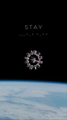 the cover art for stay album, which features an image of a space station in the background