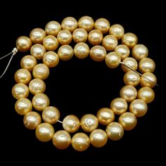 This listing is for Exceptional Quality Golden South Sea Pearl Beads, Genuine South Sea Pearl Round Beads, Pearl Beads for Jewelry, Smooth Round Pearls, 9-10MM. Gemstone: South Sea Pearl  Shape: Round  Style: Smooth Beads Size: 9-10MM approx  Length: 16 inches Strand weight: 210-220 carats approx  *Measurements are close to approximations* *100% Natural and Authentic* Authenticity Certificate available if requested. ---------------------------------------------------------------------- * Ideal t 8mm Pearl Beads For Jewelry Making, Round Pearl Beads For Jewelry Making, Pearl Spacer Beads For Jewelry Making, Pearl Beads For Jewelry Making, Polished, Large Pearl Beads For Jewelry Making, Pearl Beads For Jewelry Making, Large Gold Pearl Beads, Round Pearl Necklace With Large Beads For Jewelry Making, Golden South Sea Pearls