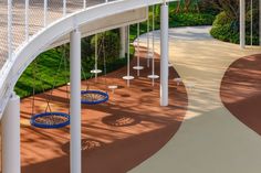 an empty playground with swings and chairs