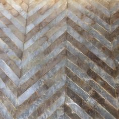 a marble chevron pattern in grey tones