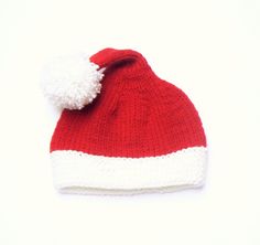 "Hand knitted Santa's hat with long tail and pom pom. Cute Christmas accessory. Choose your size using drop-down menu. Available sizes: Toddler 18-20\" Child 19-21\"  Teen/Adult small 21-22\"  Adult large/ Mens 23-24\" Color- Red and white Materials- wool acrylic blended yarn You can add a Fleece band lining inside this hat. Add to cart: https://www.etsy.com/listing/1544868515/add-on-listing-fleece-lining This hat is MADE TO ORDER! Please read my shop's policies about shipping and turnaround tim Winter Hat Women, Kids Winter Hat, Hat Pom Pom, Kids Winter Hats, Santa Costume, Women Hats, Christmas Accessories, Hat Women, Red Hat