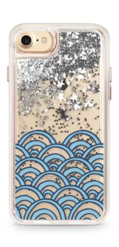 an iphone case with glitter and waves on it