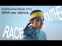 a woman wearing a yellow headband and blue jacket with the words race on it