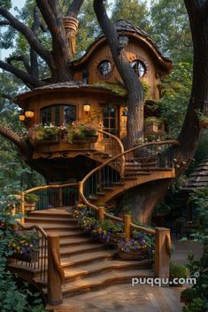 a tree house with stairs leading up to it