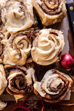 cinnamon rolls with icing and star anise on top