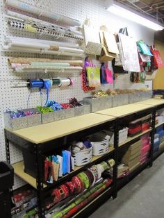 the sewing room is organized and ready for customers to use