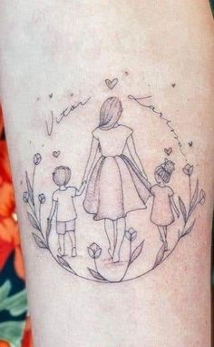 a woman and two children holding hands while standing in front of a circle with flowers