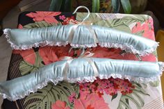 two wedding garters sitting on top of a table