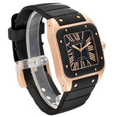 Cartier Santos 100 Rose Gold Black Dial Mens Watch W20124U2. Automatic self-winding movement. 18K rose gold case 38.0 x 38.0mm.  Octagonal crown set with black rubber. Black rubberized bezel punctuated with 8 signature 18k rose gold screws. Scratch resistant sapphire crystal. Black dial with radial Roman numerals. Inner minute track. Sword shaped rose gold hands. Secret Cartier signature at VII. Black rubber strap with 18K rose gold tang buckle. Cartier Santos 100 Xl, Cartier Santos 100, Omega Aqua Terra, Cartier Santos, Gold Watch Men, Rose Gold Case, Rose Gold Watch, Gold Hands, Gold Case